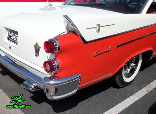 Photo of a red & white 1958 Chrysler Dodge Coronet 2 Door Hardtop Coupe at the Scottsdale Pavilions Classic Car Show in Arizona. Tailfin of a 1958 Dodge Coronet Coupe
