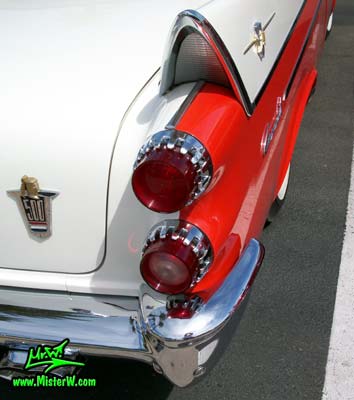 Photo of a red & white 1958 Chrysler Dodge Coronet 2 Door Hardtop Coupe at the Scottsdale Pavilions Classic Car Show in Arizona. 58 Dodge Tail Light