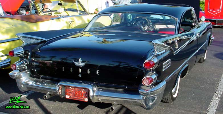 Photo of a black 1959 Chrysler Dodge Coronet 2 Door Hardtop Coupe at the Scottsdale Pavilions Classic Car Show in Arizona. Tailfins of a 59 Dodge Coupe