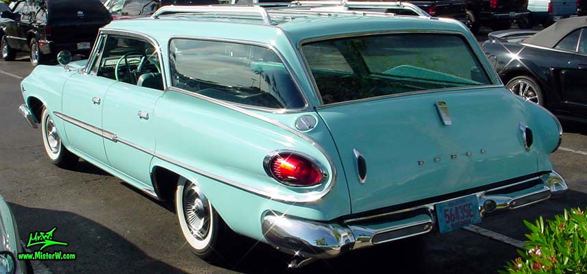 Photo of a turquoise 1961 Dodge Polara 4 door hardtop station wagen at the Scottsdale Pavilions Classic Car Show in Arizona. 1961 Dodge postless 4 door hardtop station wagen
