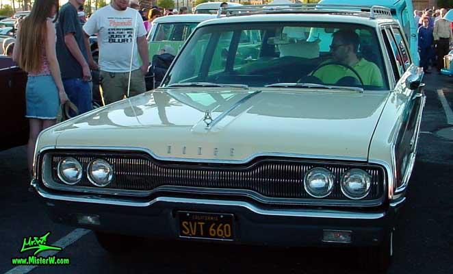Photo of a white 1966 Dodge 4 Door Station Wagon at the Scottsdale Pavilions Classic Car Show in Arizona. 1966 Dodge Station Wagon Frontview
