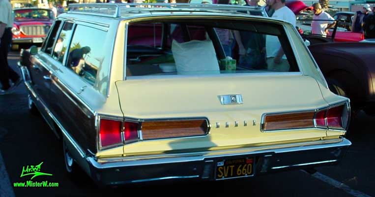 Photo of a white 1966 Dodge 4 Door Station Wagon at the Scottsdale Pavilions Classic Car Show in Arizona. 1966 Dodge Station Wagon Rearview