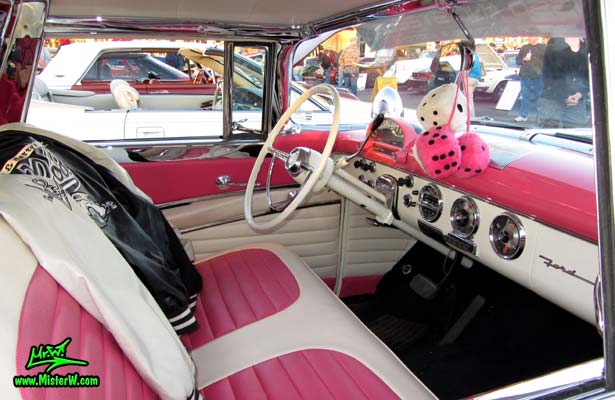 Photo of a pink & white 1955 Ford Crown Victoria 2 Door Hardtop Coupe at the Scottsdale Pavilions Classic Car Show in Arizona. Interior of a 1955 Ford Crown Victoria Coupe