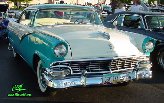 Photo of a white & turquoise 1956 Ford Fairlane 2 Door Hardtop Coupe at the Scottsdale Pavilions Classic Car Show in Arizona. Frontview of a 56 Ford Fairlane Hardtop Coupe