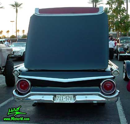 Photo of a black 1959 Ford Fairlane Retractable Hardtop / Convertible at the Scottsdale Pavilions Classic Car Show in Arizona. 1959 Ford Retractable Hardtop Rearview