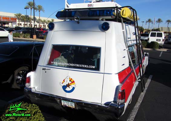 Photo of a red & white Pontiac Ambulance turned into ECTO-AZ the Arizona Ghostbusters Ectomobile at the Scottsdale Pavilions Classic Car Show in Arizona. Arizona Ghostbuster Ectomobile ECTO-AZ Tail Lights