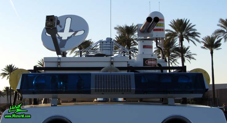 Photo of a red & white Pontiac Ambulance turned into ECTO-AZ the Arizona Ghostbusters Ectomobile at the Scottsdale Pavilions Classic Car Show in Arizona. Arizona Ghost Buster Ectomobile ECTO-AZ Ghostbusters Ecto Roof Rack Equipment & Emergency Light Bar
