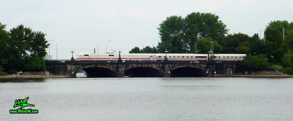 Photo of a old and a new Style ICE train on the Lombardsbr&uuml;cke in Hamburg, summer 2003 Old and new Style ICE train on the Lombardsbr&uuml;cke in Hamburg