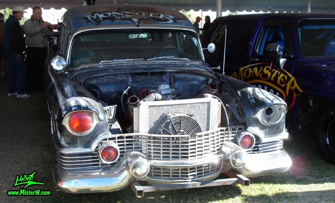 Photo of a black 1954 Cadillac Superior Funeral Coach at a classic car auction in Scottsdale, Arizona. Frontview of a 1954 Cadillac Superior