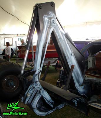 Photo of a black 1954 Cadillac Superior Funeral Coach at a classic car auction in Scottsdale, Arizona. 1954 Cadillac Superior with a plow that attaches to the car's front for filling in the graves