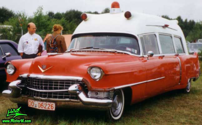 Photo of a red & white 1955 Cadillac Ambulance at a classic car meeting in Germany. 55 Caddy Ambulance Frontview