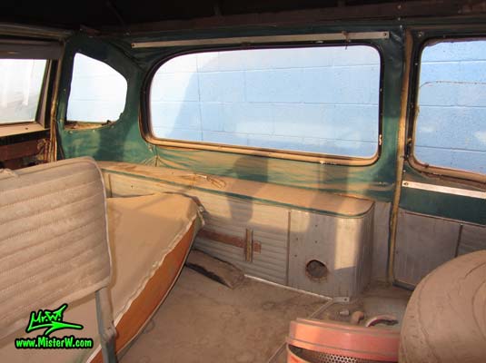 Photo of a faded grey 1956 Pontiac Memphian Ambulance in Phoenix, Arizona. Once painted red & white, in service for the Sheridan Willamina Fire Department in Oregon, build by the Memphian Coach Company in Memphis, Tennessee. Back interior of a 1956 Pontiac Memphian Ambulance