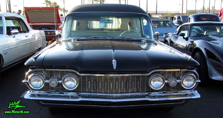 Photo of a black 1959 Oldsmobile Comet Hearse at the Scottsdale Pavilions Classic Car Show in Arizona. 59 Oldsmobile Comet Hearse Frontview