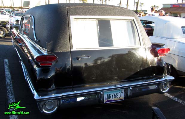 Photo of a black 1959 Oldsmobile Comet Hearse at the Scottsdale Pavilions Classic Car Show in Arizona. 59 Oldsmobile Comet Hearse Tailfins