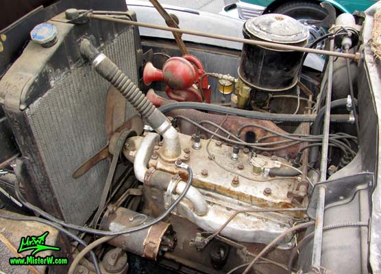 Photo of a black 1947 Hudson Super Six 4 Door Sedan at the Scottsdale Pavilions Classic Car Show in Arizona. 1947 Hudson Engine Bay