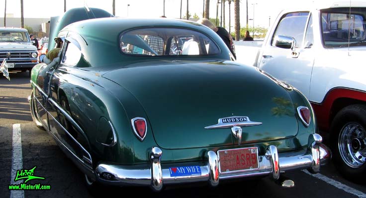 Photo of a green 1950 Hudson Super 6 Hardtop Coupe at the Scottsdale Pavilions Classic Car Show in Arizona. Reareview of a 1950 Hudson Super 6 Hardtop Coupe