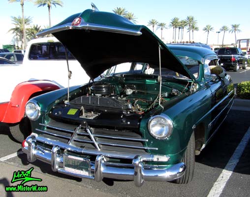 Photo of a green 1950 Hudson Super 6 Hardtop Coupe at the Scottsdale Pavilions Classic Car Show in Arizona. 50 Hudson Super Six 2 Door Hardtop Coupe