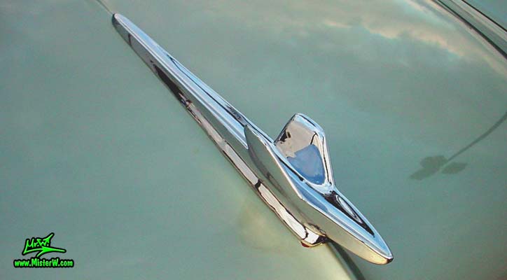 Photo of a turquoise 1959 Imperial 2 Door Hardtop Coupe at the Scottsdale Pavilions Classic Car Show in Arizona. 59 Imperial Chrome Hood Ornament