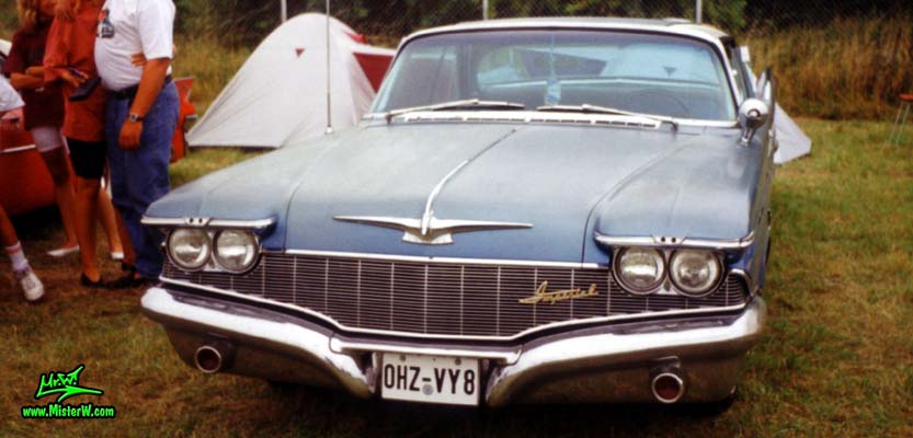 Photo of a blue 1960 Imperial 2 Door Hardtop Coupe at a classic car meeting in Germany. 1960 Imperial Frontview