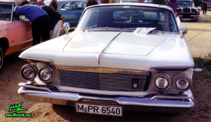 Photo of a white 1961 Imperial 4 Door Hardtop Sedan at a classic car meeting in Germany. 61 Imperial