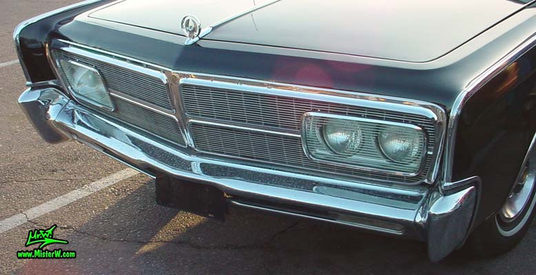 Photo of a black 1965 Imperial 2 Door Hardtop Coupe at a classic car meeting in Phoenix, Arizona. 1965 Imperial Chrome Grill