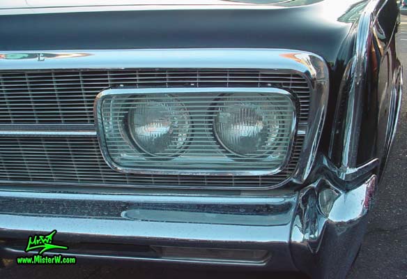 Photo of a black 1965 Imperial 2 Door Hardtop Coupe at a classic car meeting in Phoenix, Arizona. 1965 Imperial Headlights