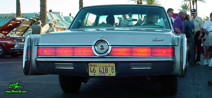 Photo of a grey 1967 Imperial 2 Door Hardtop Coupe at the Scottsdale Pavilions Classic Car Show in Arizona. 1967 Imperial Coupe Rearview