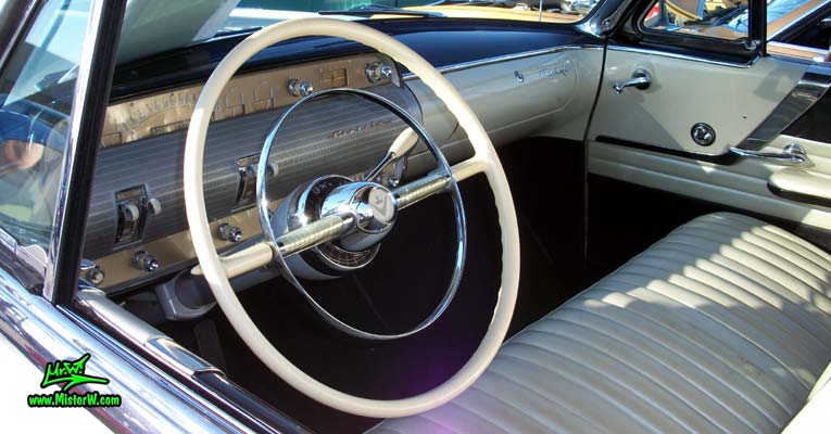 Photo of a white 1954 Lincoln Capri 2 door convertible at the Scottsdale Pavilions Classic Car Show in Arizona. Dash board & speedometer of a 1954 Lincoln Capri convertible