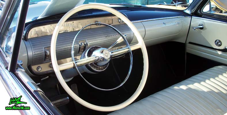 Photo of a white 1954 Lincoln Capri 2 door convertible at the Scottsdale Pavilions Classic Car Show in Arizona. Dashboard, speedometer & odometer of a 1954 Lincoln Capri convertible