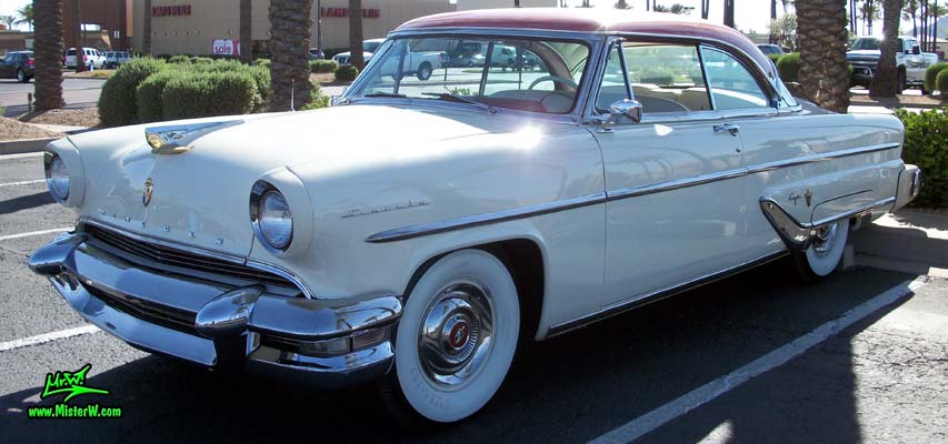 Photo of a white 1955 Lincoln Capri 2 door hardtop coupe at the Scottsdale Pavilions Classic Car Show in Arizona. 1955 Lincoln Hardtop Coupe