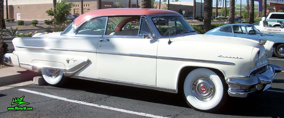 Photo of a white 1955 Lincoln Capri 2 door hardtop coupe at the Scottsdale Pavilions Classic Car Show in Arizona. 55 Lincoln Capri Coupe