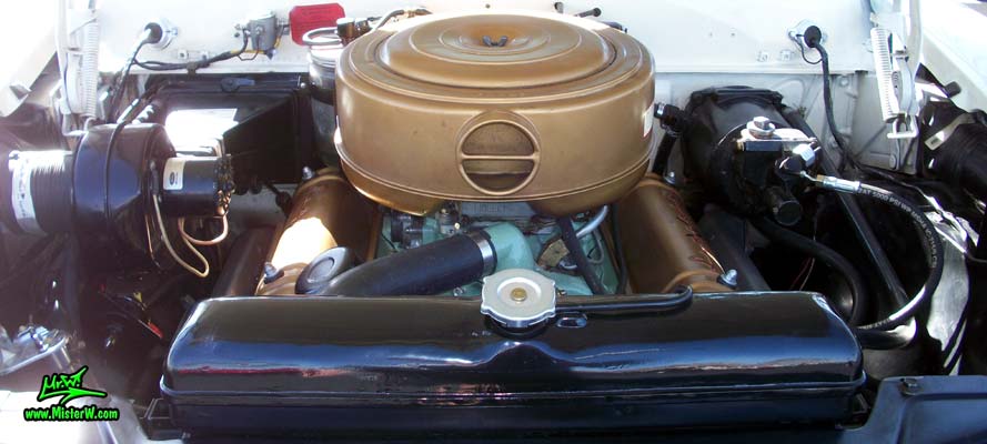 Photo of a white 1955 Lincoln Capri 2 door hardtop coupe at the Scottsdale Pavilions Classic Car Show in Arizona. V8 engine of a 1955 Lincoln Capri hardtop coupe
