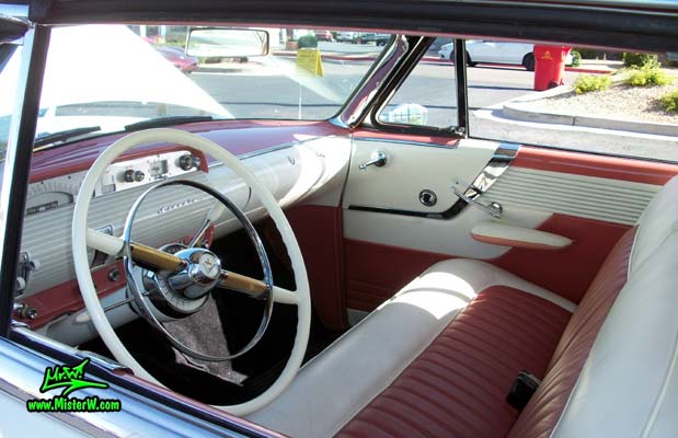 Photo of a white 1955 Lincoln Capri 2 door hardtop coupe at the Scottsdale Pavilions Classic Car Show in Arizona. Interior of a 1955 Lincoln Capri hardtop coupe