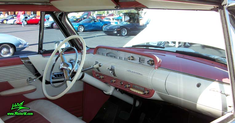 Photo of a white 1955 Lincoln Capri 2 door hardtop coupe at the Scottsdale Pavilions Classic Car Show in Arizona. Dash, speedometer & gauges of a 1955 Lincoln Capri hardtop coupe