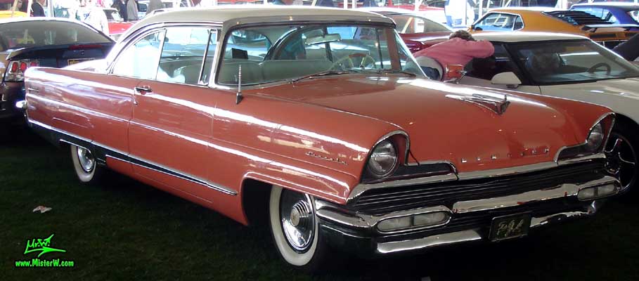 Photo of a pink 1956 Lincoln Premiere 2 door hardtop coupe at a Classic Car Auction in Scottsdale, Arizona. 56 Lincoln