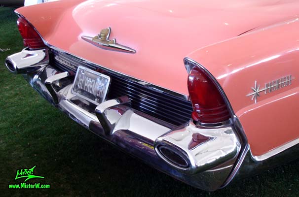 Photo of a pink 1956 Lincoln Premiere 2 door hardtop coupe at a Classic Car Auction in Scottsdale, Arizona. 1956 Lincoln Rear Bumper
