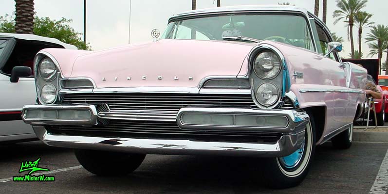 Photo of a pink & white 1957 Lincoln Premiere 2 door hardtop coupe at the Scottsdale Pavilions Classic Car Show in Arizona. Pink 57 Lincoln