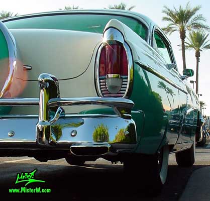 Photo of a white & turkquoise 1956 Mercury Monterey 4 Door Hardtop Sedan at the Scottsdale Pavilions Classic Car Show in Arizona. 1956 Mercury Tail Light