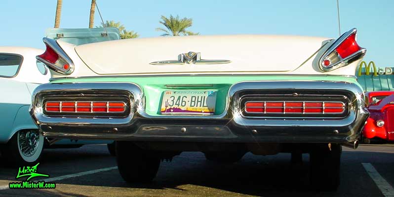 Photo of a white & turkquoise 1957 Mercury Monterey 2 Door Convertible at the Scottsdale Pavilions Classic Car Show in Arizona. 1957 Mercury Rear Bumper & Chrome