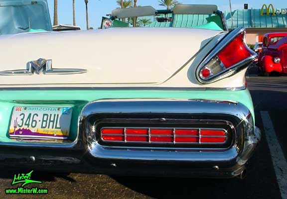 Photo of a white & turkquoise 1957 Mercury Monterey 2 Door Convertible at the Scottsdale Pavilions Classic Car Show in Arizona. 1957 Mercury Tail Light