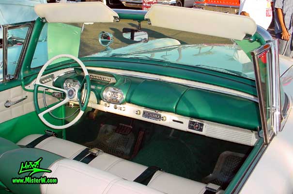 Photo of a white & turkquoise 1957 Mercury Monterey 2 Door Convertible at the Scottsdale Pavilions Classic Car Show in Arizona. 1957 Mercury Dash Board & Steering Column