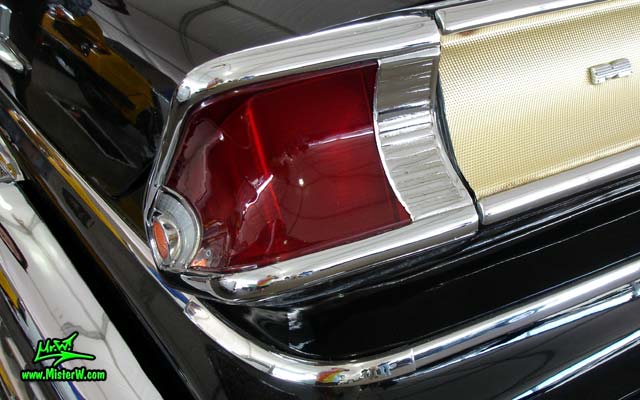 Photo of a black 1957 Mercury 2 Door Hardtop Coupe at a classic car auction in Scottsdale, Arizona. Tail Light of a 57 Mercury Hardtop Coupe