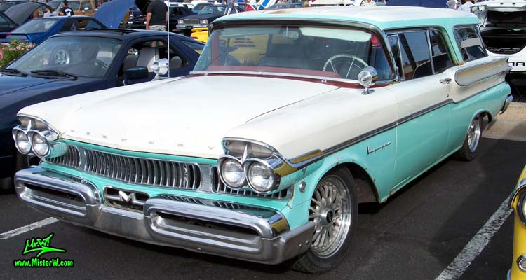 Photo of a white & turkquoise 1957 Mercury Voyager 2 Door Station Wagon at the Scottsdale Pavilions Classic Car Show in Arizona. 57 Mercury 2 Door Station Wagon