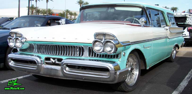 Photo of a white & turkquoise 1957 Mercury Voyager 2 Door Station Wagon at the Scottsdale Pavilions Classic Car Show in Arizona. Sideview of a 57 Mercury Voyager 2 Door Stationwagon