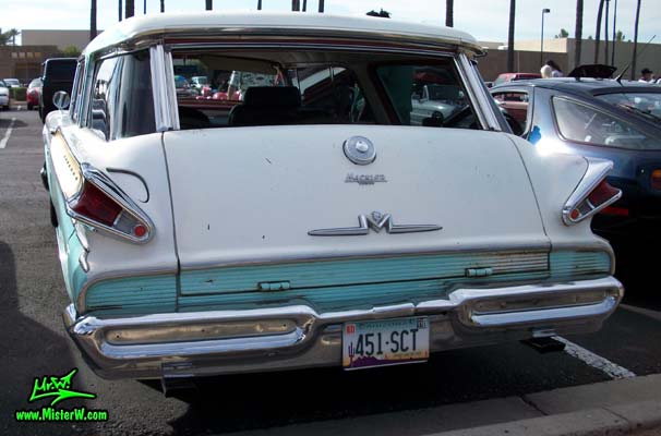 Photo of a white & turkquoise 1957 Mercury Voyager 2 Door Station Wagon at the Scottsdale Pavilions Classic Car Show in Arizona. 1957 Mercury Wagon Tail Gate