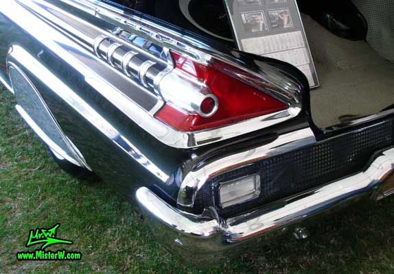Photo of a black 1959 Mercury Montclair 2 Door Hardtop Coupe at a Classic Car Auction in Scottsdale, Arizona. 1959 Mercury Rear Light & Fin