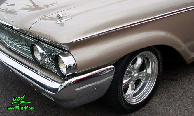 Photo of a beige 1960 Mercury Monterey 2 Door Hardtop Coupe at the Scottsdale Pavilions Classic Car Show in Arizona. 1960 Mercury Head Lights & Bumper Corner