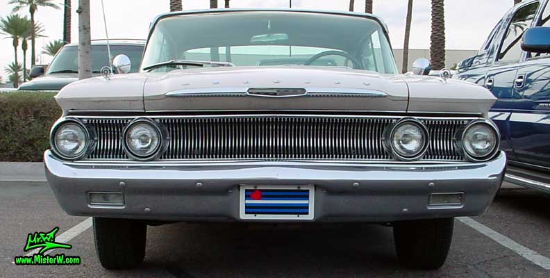 Photo of a white 1960 Mercury Monterey 4 Door Hardtop Sedan at the Scottsdale Pavilions Classic Car Show in Arizona. 1960 Mercury Monterey Sedan Front Chrome Grill