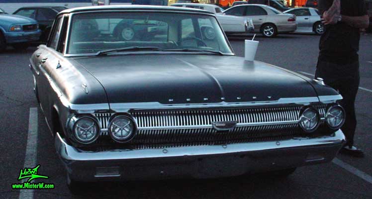 Photo of a flat black 1962 Mercury 4 Door Hardtop Sedan at a Classic Car Meeting in Arizona. 1962 Mercury Frontview