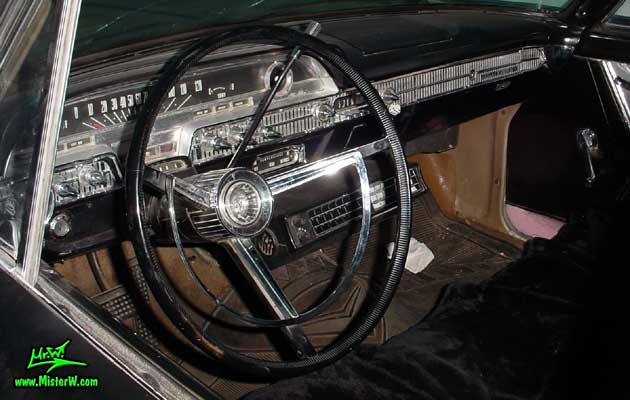 Photo of a flat black 1962 Mercury 4 Door Hardtop Sedan at a Classic Car Meeting in Arizona. 1962 Mercury Dashboard & Odometer